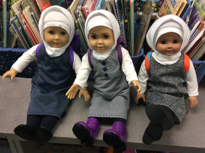 Transformed store dolls, dressed in hijabs.